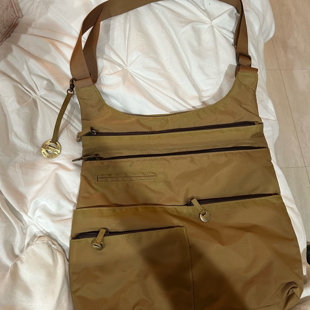 Travelon Tan Messenger Bag with Adjustable Strap and Canvas Material
